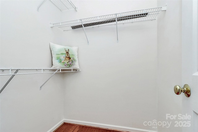 4263 Melrose Club Dr, Matthews, NC 28105 - spacious closet with wood finished floors