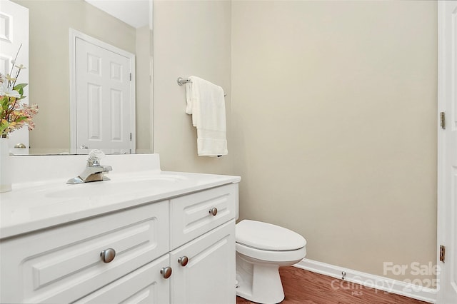 4263 Melrose Club Dr, Matthews, NC 28105 - half bath with vanity and wood finished floors