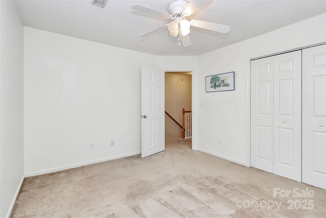 4263 Melrose Club Dr, Matthews, NC 28105 - unfurnished bedroom featuring carpet floors, a closet, and ceiling fan