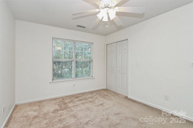 4263 Melrose Club Dr, Matthews, NC 28105 - unfurnished bedroom featuring carpet, a closet, and ceiling fan