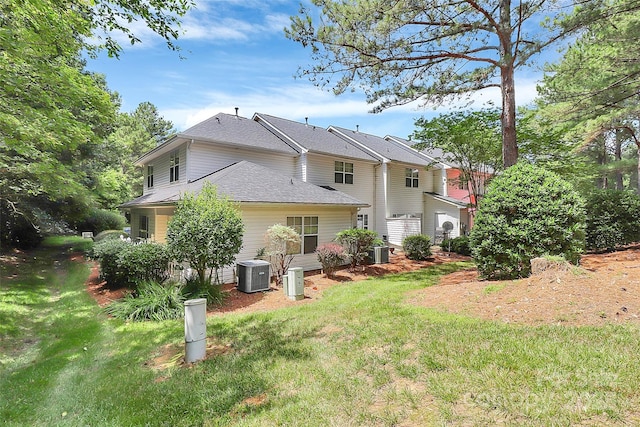 4263 Melrose Club Dr, Matthews, NC 28105 - rear view of property featuring a yard and roof with shingles