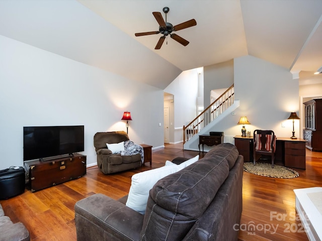 1423 Piper Ct, Concord, NC 28025 - living area featuring stairway, ceiling fan, wood finished floors, and vaulted ceiling