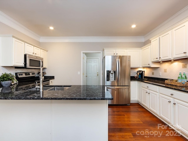 1423 Piper Ct, Concord, NC 28025 - kitchen featuring stainless steel appliances, dark stone countertops, a peninsula, crown molding, and recessed lighting