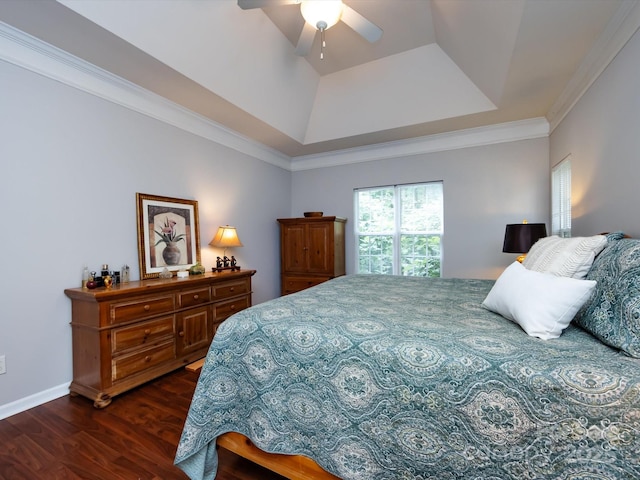 1423 Piper Ct, Concord, NC 28025 - bedroom featuring dark wood finished floors, a tray ceiling, ornamental molding, and a ceiling fan