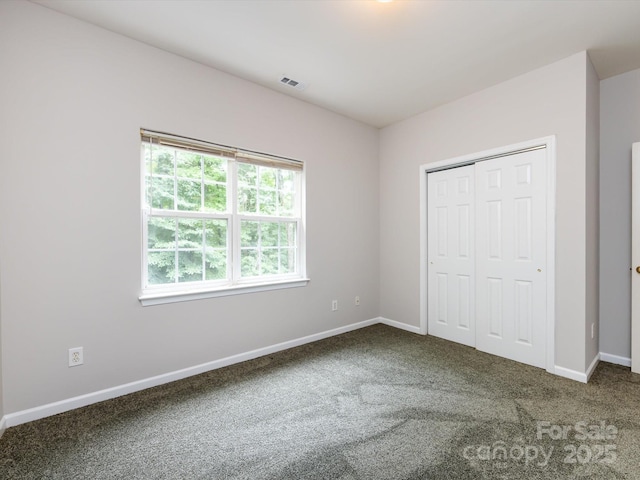 1423 Piper Ct, Concord, NC 28025 - unfurnished bedroom with carpet flooring and a closet