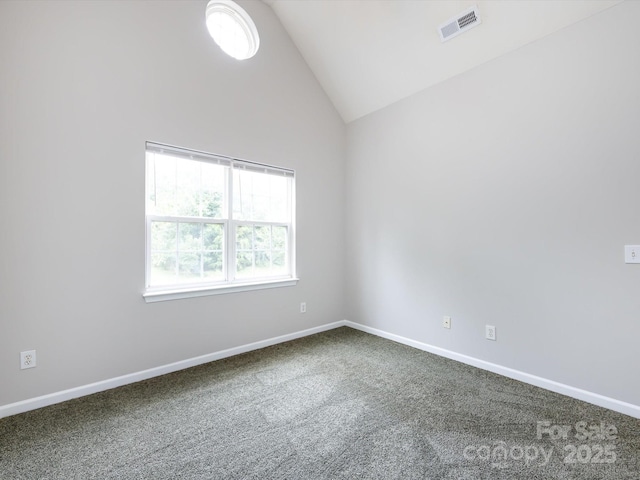 1423 Piper Ct, Concord, NC 28025 - empty room featuring vaulted ceiling and dark carpet