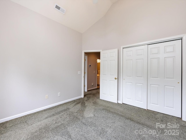 1423 Piper Ct, Concord, NC 28025 - unfurnished bedroom featuring carpet, high vaulted ceiling, and a closet