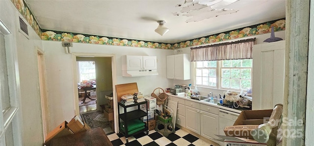 600 College Ave, Rock Hill, SC 29730 - kitchen featuring light flooring, plenty of natural light, white cabinetry, and a sink
