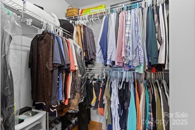 9637 Brookmere Ln, Charlotte, NC 28214 - spacious closet with wood finished floors