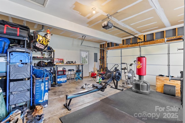 9637 Brookmere Ln, Charlotte, NC 28214 - garage featuring electric panel and a garage door opener