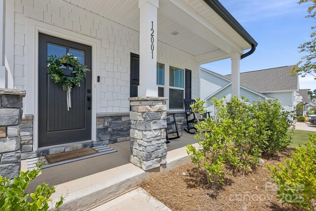 12001 Sam Snead Ct, Lancaster, SC 29720 - entrance to property with stone siding and covered porch