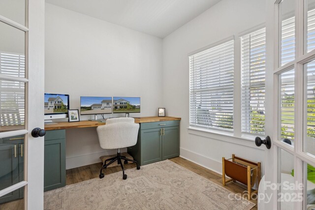 12001 Sam Snead Ct, Lancaster, SC 29720 - home office featuring light wood-style floors and baseboards