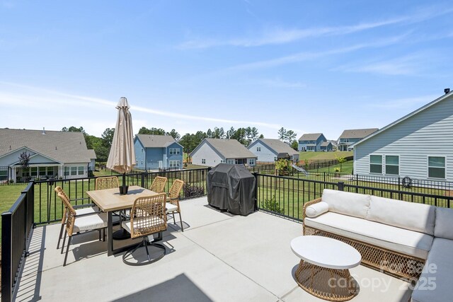 12001 Sam Snead Ct, Lancaster, SC 29720 - fenced backyard with a residential view, a grill, a patio, outdoor dining area, and outdoor lounge area