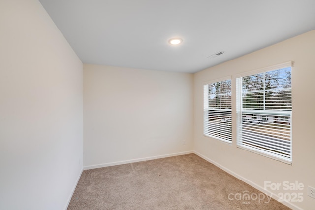 834 N Flint St, Lincolnton, NC 28092 - empty room with light carpet, baseboards, and recessed lighting