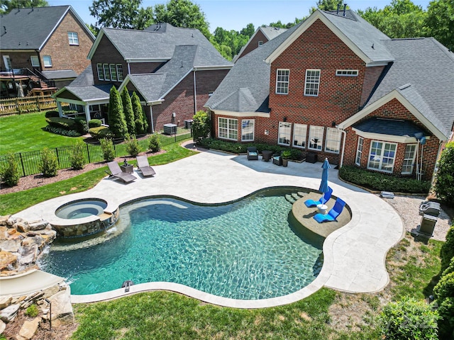 2504 River Oaks Dr, Waxhaw, NC 28173 - view of swimming pool featuring a patio, a fenced backyard, and a pool with connected hot tub