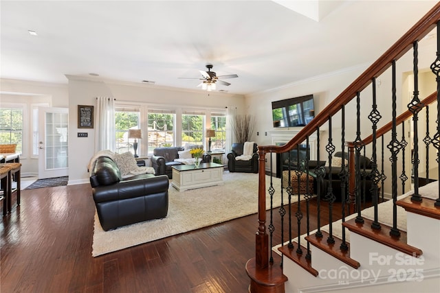 2504 River Oaks Dr, Waxhaw, NC 28173 - living area with ceiling fan, dark wood finished floors, crown molding, and stairway