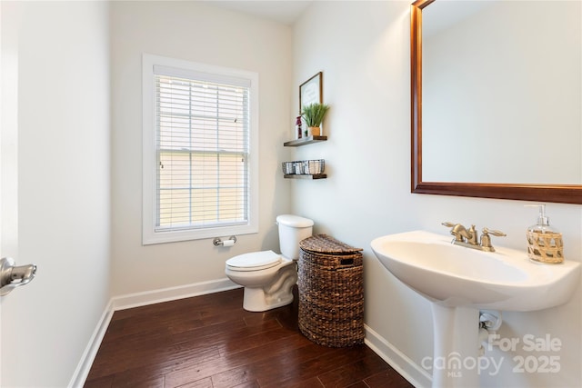 2504 River Oaks Dr, Waxhaw, NC 28173 - bathroom featuring wood-type flooring and toilet