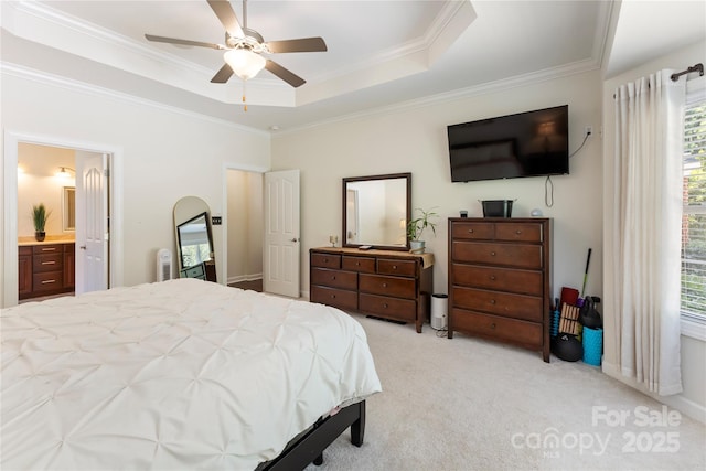 2504 River Oaks Dr, Waxhaw, NC 28173 - bedroom featuring light carpet, crown molding, a tray ceiling, a ceiling fan, and connected bathroom