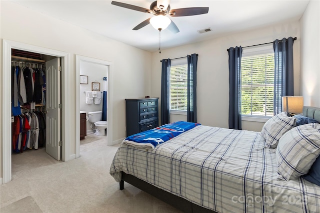 2504 River Oaks Dr, Waxhaw, NC 28173 - bedroom with multiple windows, a spacious closet, a closet, and light carpet