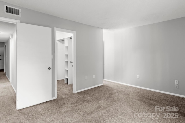 2205 Sunderland Rd Unit 129D, Winston Salem, NC 27103 - carpeted spare room featuring baseboards