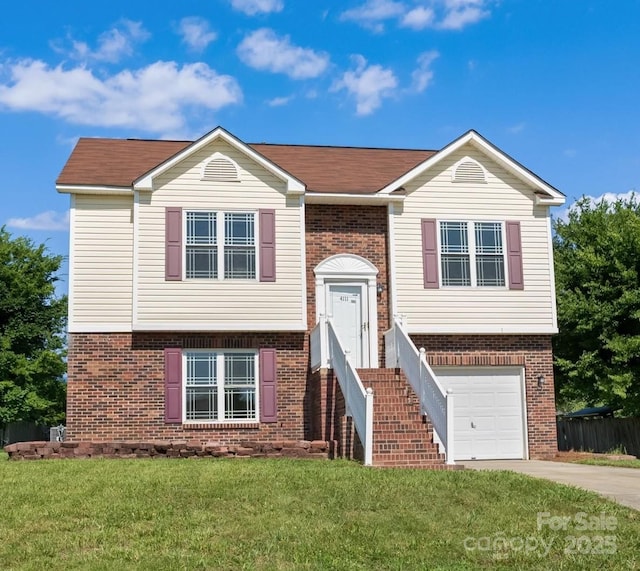 4111 Alexis Ct SW, Concord, NC 28027 - raised ranch with brick siding, an attached garage, and driveway