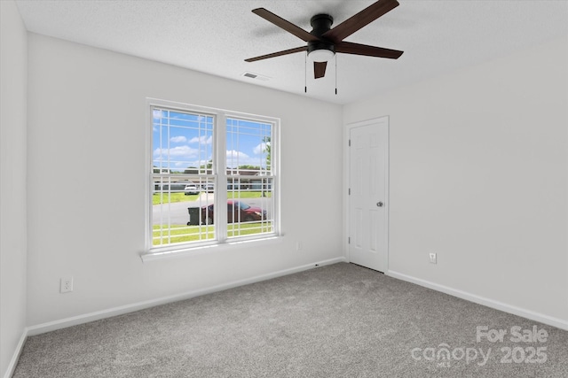 4111 Alexis Ct SW, Concord, NC 28027 - spare room with carpet floors and ceiling fan