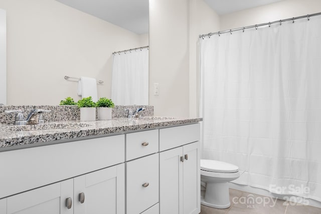 3038 Burnello Ct, Iron Station, NC 28080 - bathroom with double vanity, tile patterned floors, and curtained shower