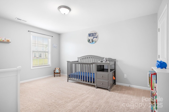 3038 Burnello Ct, Iron Station, NC 28080 - carpeted bedroom featuring baseboards and a nursery area