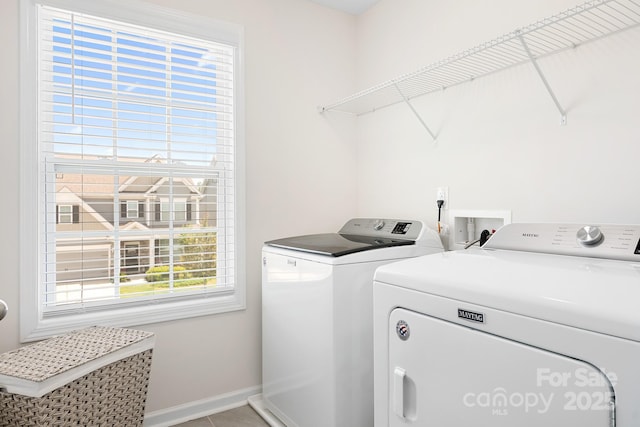 3038 Burnello Ct, Iron Station, NC 28080 - laundry room with independent washer and dryer and baseboards