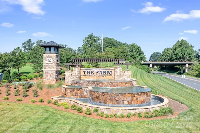 3038 Burnello Ct, Iron Station, NC 28080 - community sign featuring a lawn and view of wooded area