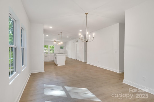 5175 Grand Canyon Rd, Concord, NC 28027 - unfurnished living room with light wood finished floors, healthy amount of natural light, and recessed lighting