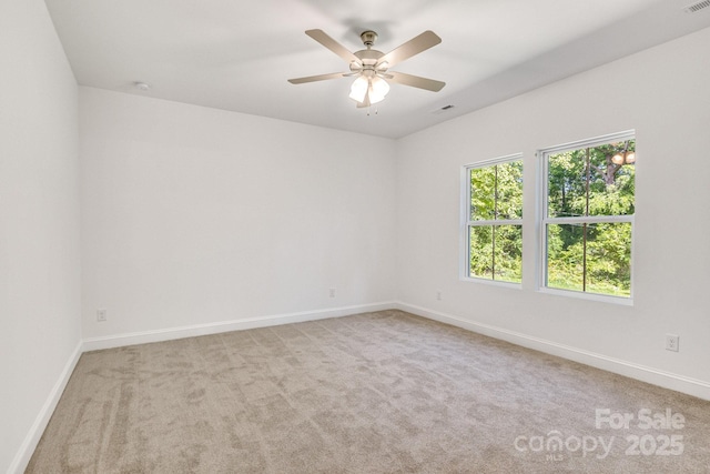 5175 Grand Canyon Rd, Concord, NC 28027 - unfurnished room featuring carpet, baseboards, and ceiling fan