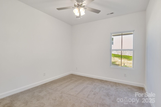 5175 Grand Canyon Rd, Concord, NC 28027 - empty room featuring light carpet, baseboards, and a ceiling fan