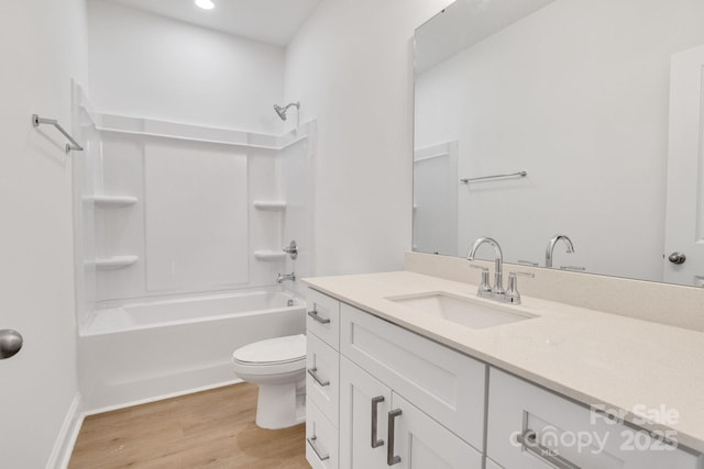 5175 Grand Canyon Rd, Concord, NC 28027 - full bathroom with vanity, wood finished floors, toilet,  shower combination, and baseboards