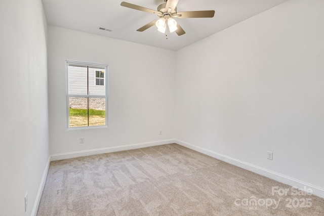 5175 Grand Canyon Rd, Concord, NC 28027 - empty room with light carpet, baseboards, and ceiling fan