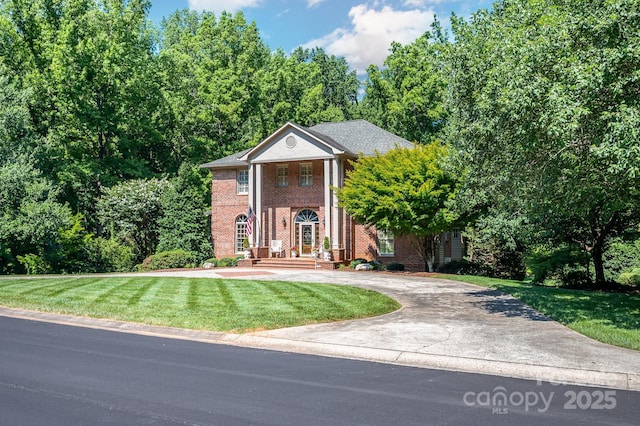 408 Johnsfield Rd, Shelby, NC 28150 - greek revival inspired property with brick siding, a front lawn, and driveway