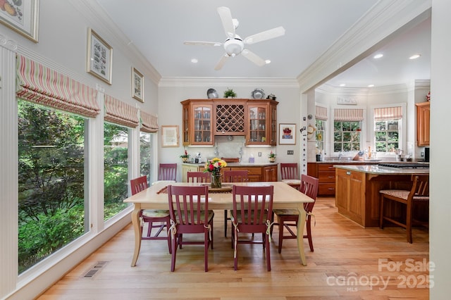 408 Johnsfield Rd, Shelby, NC 28150 - dining room featuring plenty of natural light, light wood-style floors, crown molding, recessed lighting, and ceiling fan
