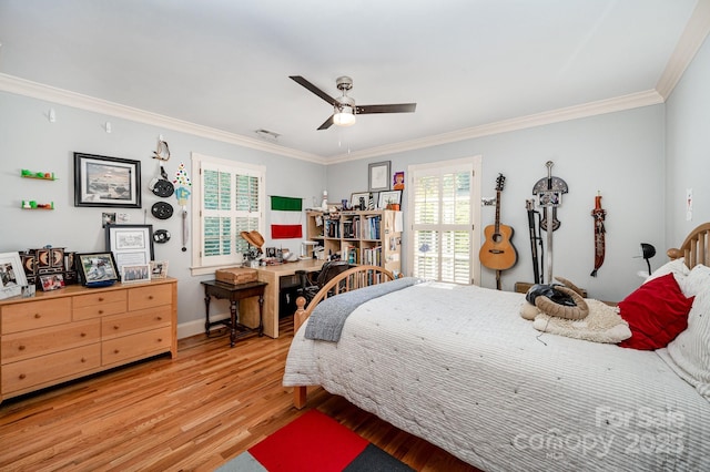 408 Johnsfield Rd, Shelby, NC 28150 - bedroom with wood finished floors, ornamental molding, multiple windows, and a ceiling fan
