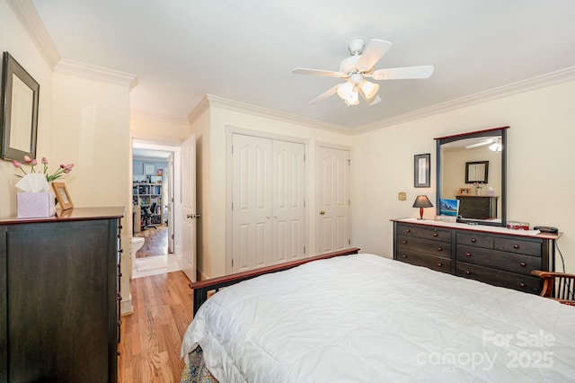 408 Johnsfield Rd, Shelby, NC 28150 - bedroom featuring light wood finished floors, ornamental molding, a closet, and ceiling fan
