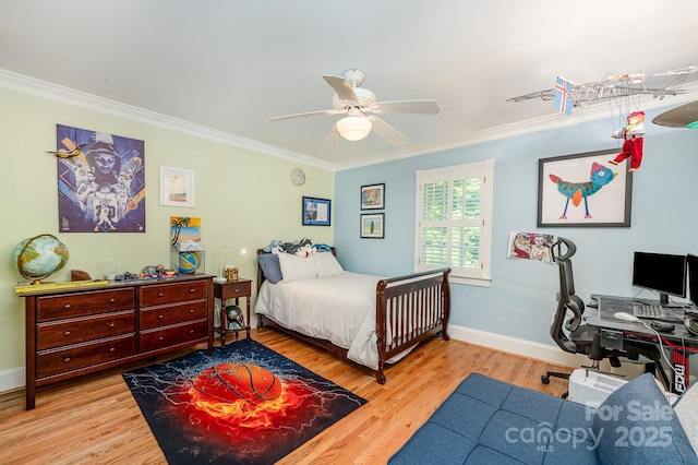 408 Johnsfield Rd, Shelby, NC 28150 - bedroom featuring ornamental molding, wood finished floors, an office area, and a ceiling fan