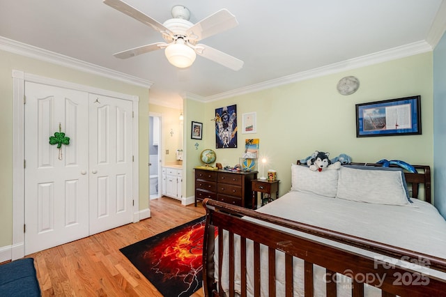 408 Johnsfield Rd, Shelby, NC 28150 - bedroom with light wood-type flooring, ornamental molding, a closet, ceiling fan, and ensuite bathroom
