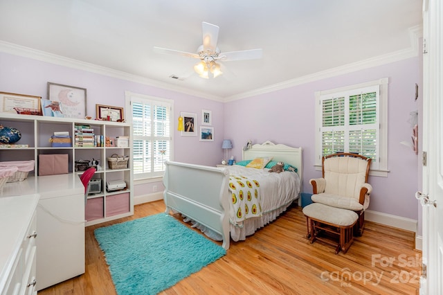 408 Johnsfield Rd, Shelby, NC 28150 - bedroom with light wood-style floors, ornamental molding, and ceiling fan