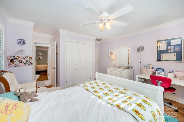 408 Johnsfield Rd, Shelby, NC 28150 - bedroom featuring ornamental molding, wood finished floors, a closet, and ceiling fan
