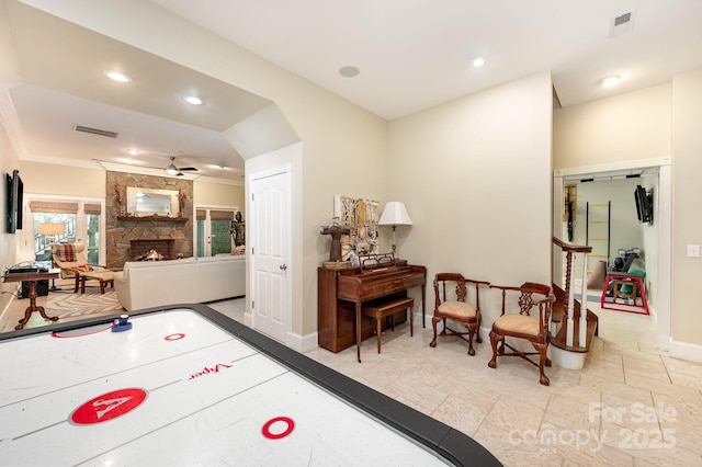 408 Johnsfield Rd, Shelby, NC 28150 - playroom with a ceiling fan, a fireplace, recessed lighting, and ornamental molding