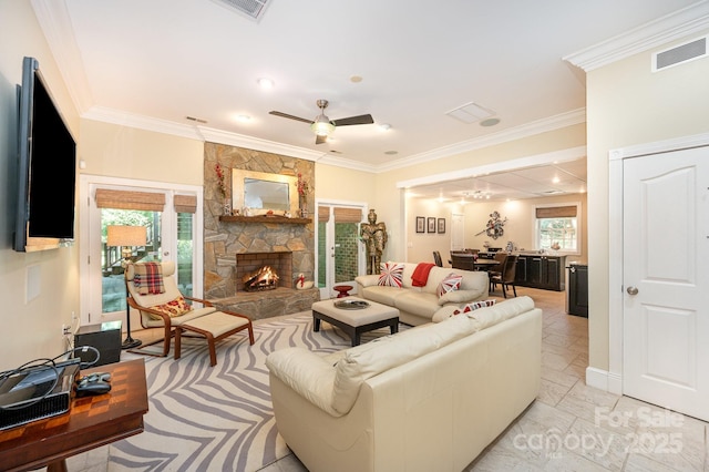 408 Johnsfield Rd, Shelby, NC 28150 - living room with a stone fireplace, crown molding, and ceiling fan