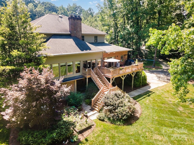 408 Johnsfield Rd, Shelby, NC 28150 - back of house featuring a deck, a vegetable garden, stairs, a chimney, and roof with shingles