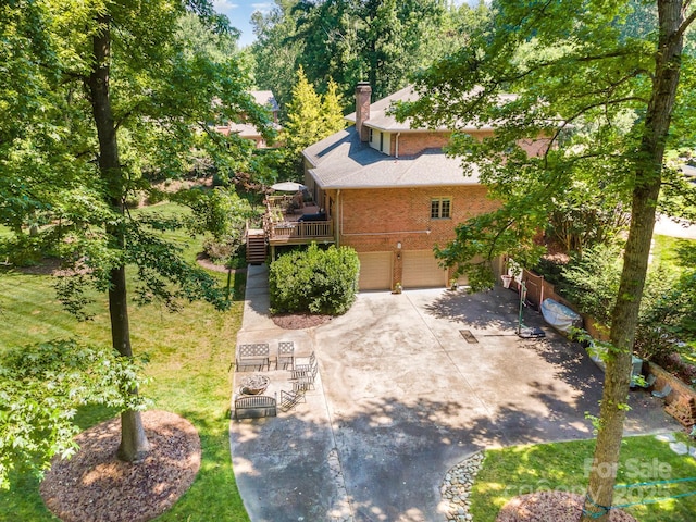 408 Johnsfield Rd, Shelby, NC 28150 - view of yard with a garage, a wooden deck, stairs, and concrete driveway