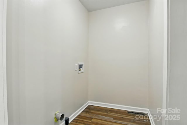 3923 US Highway 321a, Hudson, NC 28638 - laundry area with washer hookup, dark wood-style floors, and baseboards