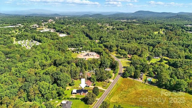 3923 US Highway 321a, Hudson, NC 28638 - view of property location with a heavily wooded area and mountains