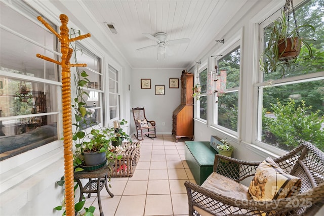261 Forest Hill Dr, Asheville, NC 28803 - sunroom / solarium featuring tile patterned floors, healthy amount of natural light, ceiling fan, and crown molding
